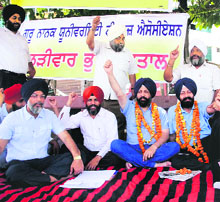 Members of the Guru Nanak Dev University Teachers Association during the chain hunger strike in Amritsar on Thursday.