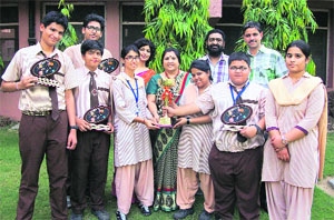 Students of DAV Public School after winning the Mega Event Spirit-2013 in Amritsar on Thursday. 
