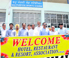 Members of the Bathinda Hotels, Restaurants and Resorts Association hold protest in Bathinda on Thursday.