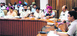ADC Mohammad Tayyab presides over a workshop held to inform officials about the portal on Thursday.