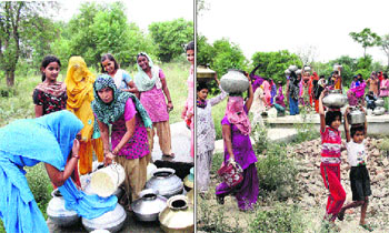 Residents of Kila Zafargarh village in Jind district fetch water from a well in the village. 