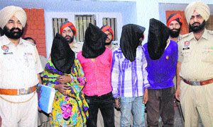 The accused in police custody. 