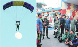 An IAF officer takes part in parasailing and (above) a workshop on skydiving underway in Jammu on Thursday. Tribune photographs