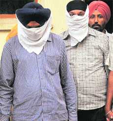 The accused in the police custody on Friday. 