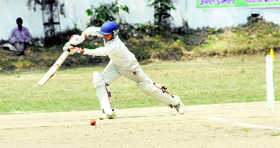 A batsman in action in a match in the 31st All-India Uttarakhand Gold Cup Cricket Tournament played at Rangers' College grounds in Dehradun on Friday.