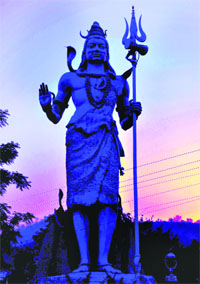  A panoramic view of a grand Lord Shiva statute installed at Swami Vivekananda Park near a Ganga ghat captured by Tribune lensman against a magnificent natural colourful setting in Haridwar. 