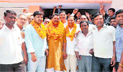 Newly appointed BJP national general secretary of the Scheduled Castes Cell Suresh Rathore being given a rousing welcome by party workers in Haridwar on Friday. 