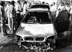 A car that caught fire due to intense heat in Sector 14, Gurgaon, on Friday