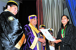 President Pranab Mukherjee awards a degree to a student during the 20th convocation of Himachal Pradesh University in Shimla on Friday