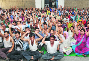 Jammu University staff hold a rally as their token strike entered the eleventh day today. 