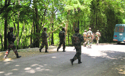Army soldiers at the encounter site where four jawans were killed by militants in south Kashmirs Pulwama district on Friday.