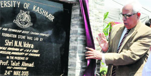 Governor NN Vohra lays the foundation stone of the science and technology block of Kashmir University on Friday. 