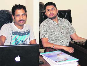 Biswa Dutta (L) and Karamjit Singh have enabled around 500 Punjabi books to get digitalised
