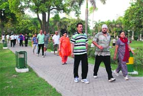 Fitness Freak: Residents doing morning walk at the Rose Garden in Bathinda on Saturday