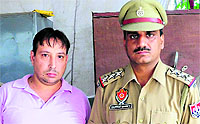 One of the accused, Hemant Anand, in the police custody at the Phase I police station in Mohali on Saturday