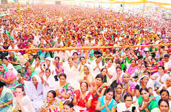 Devotees listen to a religious discourse by  Asaram Bapu in Haridwar on Saturday.