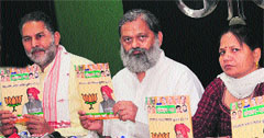 (From left) Ram Bilas Sharma, BJP president, Anil Vij, MLA, Ambala, and Banto Kataria at the release of MC manifesto in Sector 27, Chandigarh, on Saturday. Tribune photo:Manoj Mahajan