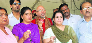 Residents of Qazi Mandi protest in Jalandhar on Saturday. 