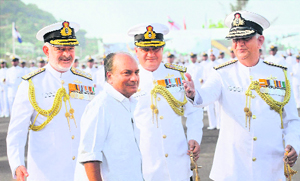 Defence Minister AK Antony arrives to attend the passing-out ceremony of the 84th batch of cadets of the Indian Naval Academy at Ezhimala in Kannur on Saturday. Chief of the Naval staff Admiral DK Joshi (L), Vice Admiral Satish Soni (C) and Vice Admiral Pradeep Chauhan are also seen.