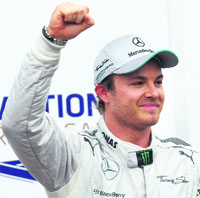 Nico Rosberg celebrates his pole position for the Monaco F1 GP on Saturday. 