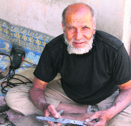 A metal craftsman at Nizwa