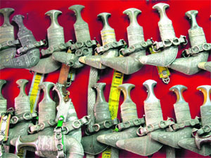 The traditional Omani dagger with intricate filigree work, called khanjar is a popular souvenir