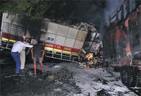 The trucks that caught fire after a collision on the Rajpura-Chandigarh road on Sunday