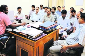 Dehradun District Magistrate BVRC Purushottam at a meeting to review drinking water schemes in Dehradun on Sunday