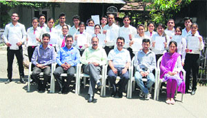 Principal Satish Chander Sharma, Dr NN Sharma, coordinator, MBA, and faculty members with placed students of MBA first batch.