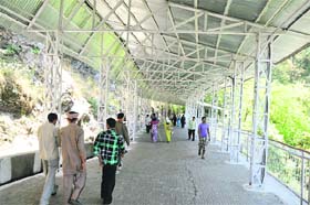The newly installed tin sheds covering the pilgrim route