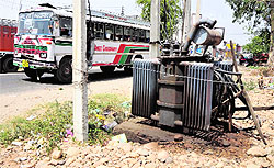 An electric transformer lies without the security fence at Govind Pura Basti at RS Pura in Jammu