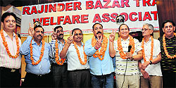 New office-bearers of Rajinder Bazar Traders Welfare Association in Jammu on Sunday
