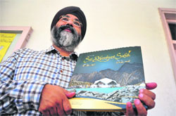 Ranjodh Singh with his book, Sri Hemkunt Sahib: A Mystic Pilgrimage, in Ludhiana. 
