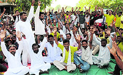 Garbage collectors working under the JITF Urban Waste Management holding a protest at Blue Fox in Bathinda on Monday