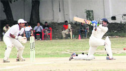 A batsman in action during a match in the 31st All-India Uttarakhand Gold Cup Cricket Tournament in Dehradun on Monday. Tribune photo: Vinod Pundir