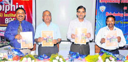 Dignitaries release a manual at the inauguration of a training programme at the Dolphin Institute of Biomedical and Natural Sciences in Dehradun on Monday.