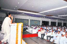 Minister Kiran Choudhry addresses a meeting organised by the Haryana Excise and Taxation Inspectors Association in Bhiwani on Monday