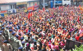 Anganwari workers hold a rally at the Secretariat in Shimla on Monday