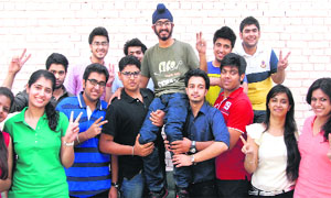 Apeejay School students celebrate their success after the declaration of the results of Class XII CBSE exams in Jalandhar on Monday. 