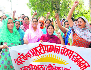 Multipurpose health workers take out a protest march against the government in Jalandhar on Monday. 