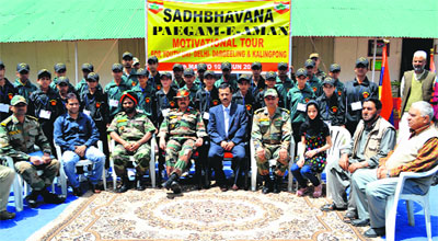 Army officers along with a group of youth during the flagging off ceremony of a motivational tour in Uri on Monday. 