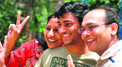 Ritish Goyal, topper in non-medical shares a moment of joy with his parents.