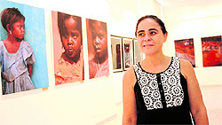 Magali Couffon De Trevros with her photographs