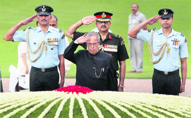 President Pranab Mukherjee pays tributes to Pt Jawaharlal Nehru on his 49th death anniversary at Shanti Van in New Delhi on Monday. 