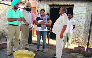 Officers raid a sweets shop at Jagatpura in Mohali on Tuesday. 
