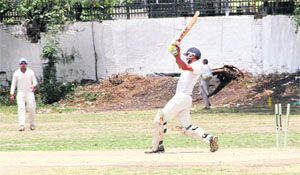 A batsman in action during a match in the 31st All-India Uttarakhand Gold Cup Cricket Tournament in Dehradun on Tuesday. 