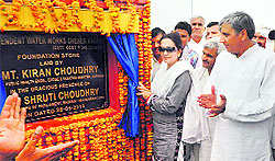 Haryana Minister Kiran Choudhry lays the foundation stone of a drinking water project at Chaharkhurd in Bhiwani on Tuesday