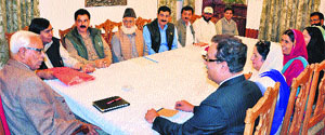 A delegation of the Jammu and Kashmir Political Migrants Front during a meeting with Governor NN Vohra at Raj Bhawan in Srinagar on Tuesday. 