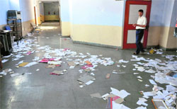 Garbage lies scattered in the corridors of the Jammu University campus in Jammu on Tuesday. Tribune photo: Anand Sharma