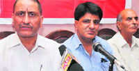 Leaders of the Panun Kashmir address mediapersons in jammu on Tuesday. Tribune photo: Inderjeet Singh